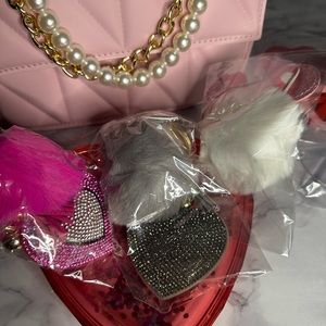 Pink square purse with gold chain and pearl detail